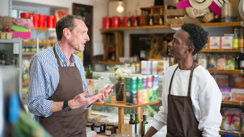 shop owner speaking with customer